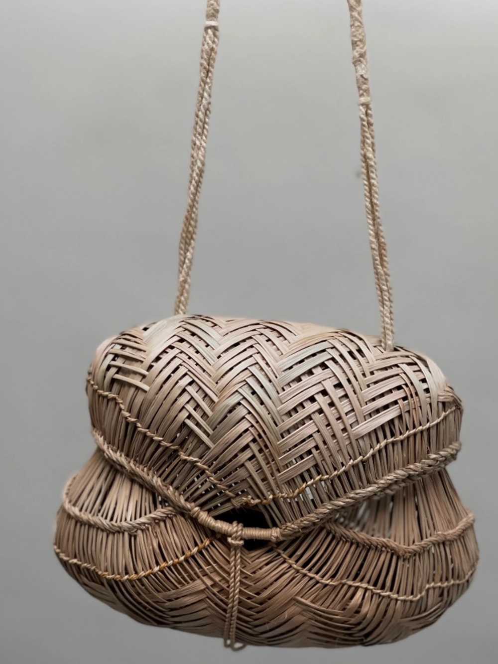 Hand-woven Xavante Baquité Carrier Basket featuring a distinct chevron pattern